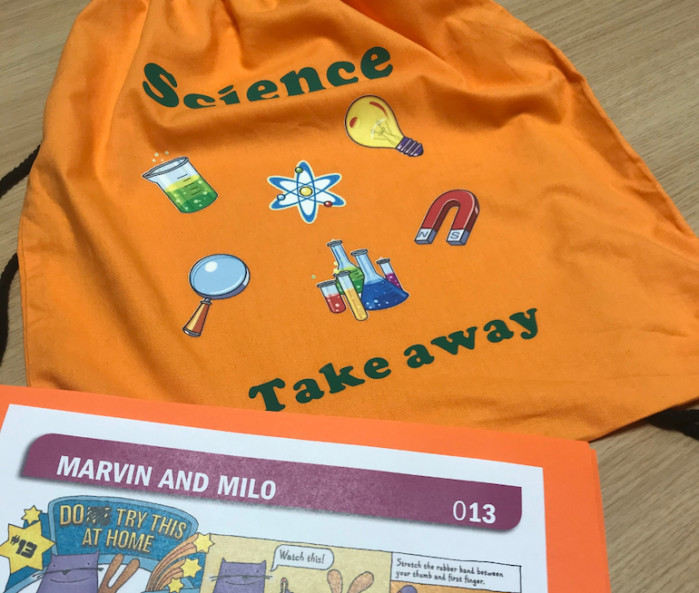 The science take away bag and a Marvin and Milo card