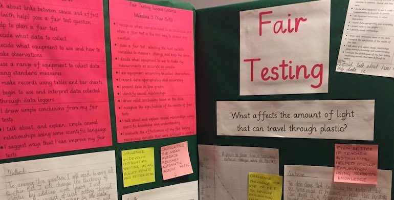 classroom science display featuring fair testing