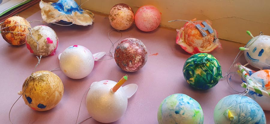 a selection of model planets - made from polystyrene baubles and painted